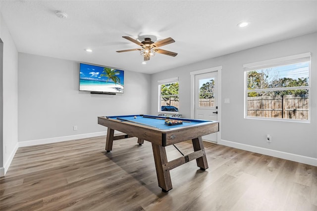 playroom featuring wood-type flooring, ceiling fan, and pool table