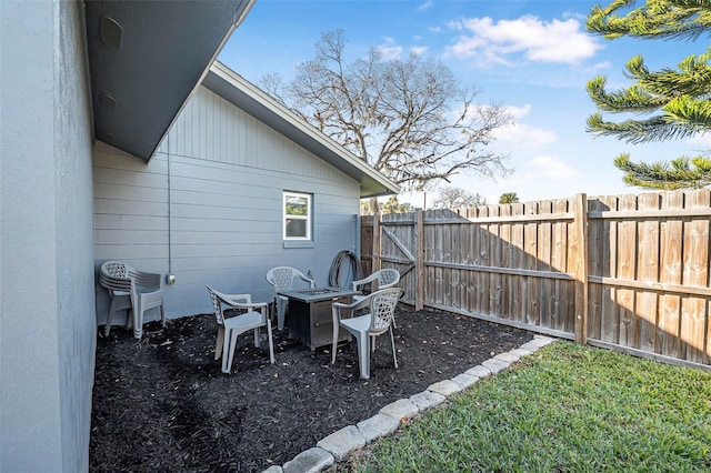 view of patio featuring a fire pit