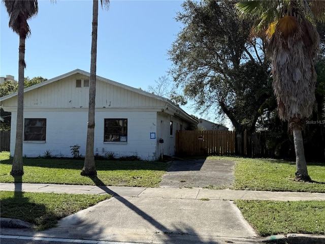 view of home's exterior featuring a yard