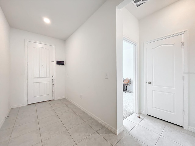 view of tiled foyer entrance