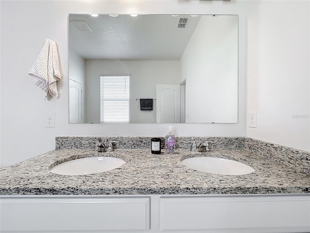 bathroom featuring vanity