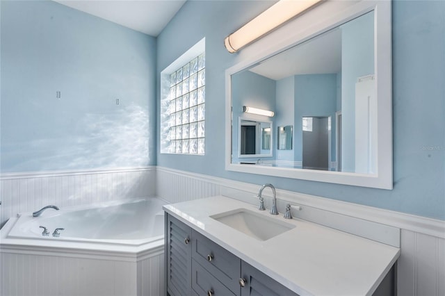 bathroom featuring vanity and a bathtub