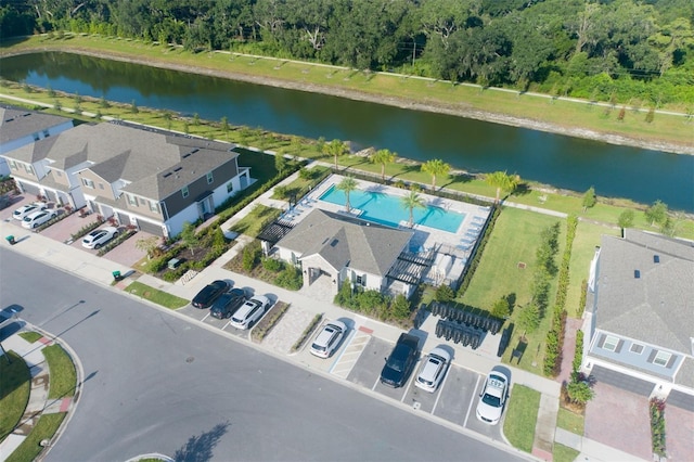 birds eye view of property featuring a water view