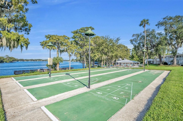 view of home's community with a water view