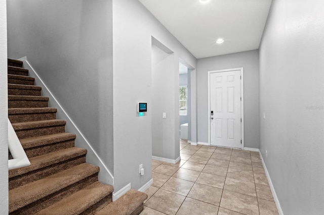 view of tiled foyer entrance