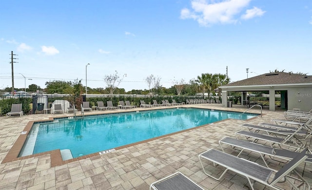 view of swimming pool with a patio area and a gazebo