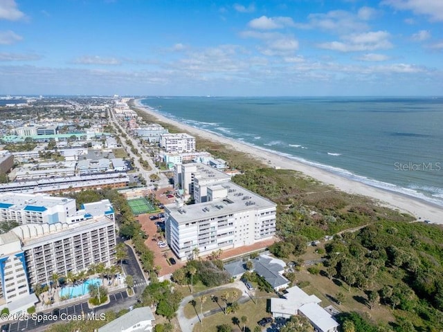 drone / aerial view with a view of the beach and a water view