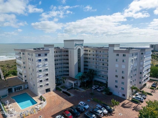 view of building exterior with a water view