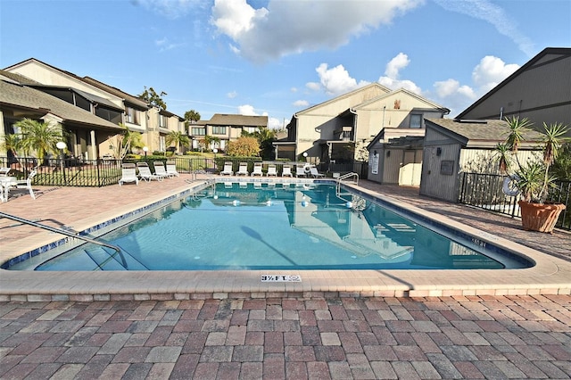 view of swimming pool featuring a patio