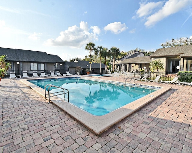 view of swimming pool featuring a patio area