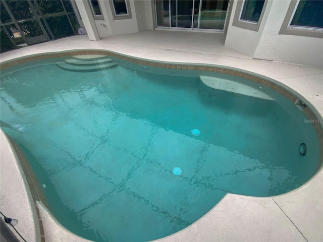 view of pool with a patio area