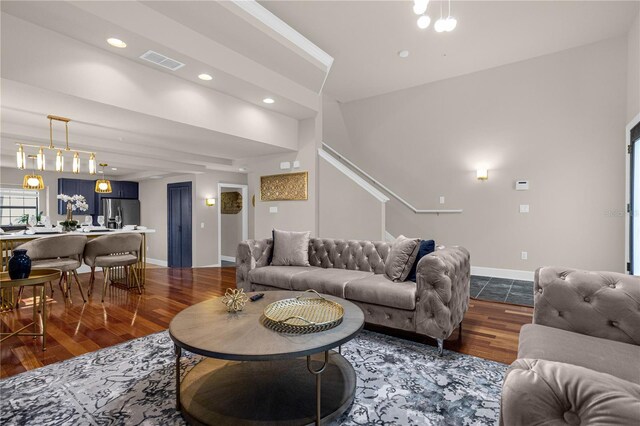 living room with dark wood-type flooring