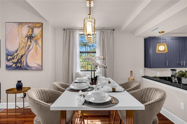 dining area with dark hardwood / wood-style flooring and breakfast area