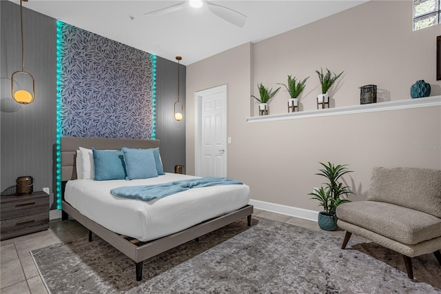 tiled bedroom with ceiling fan