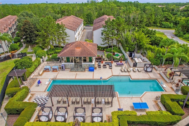 view of swimming pool featuring a gazebo and a patio area