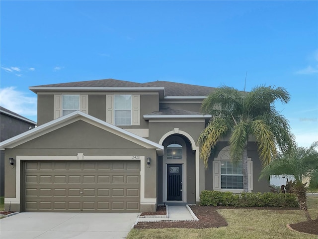 view of front of house with a garage