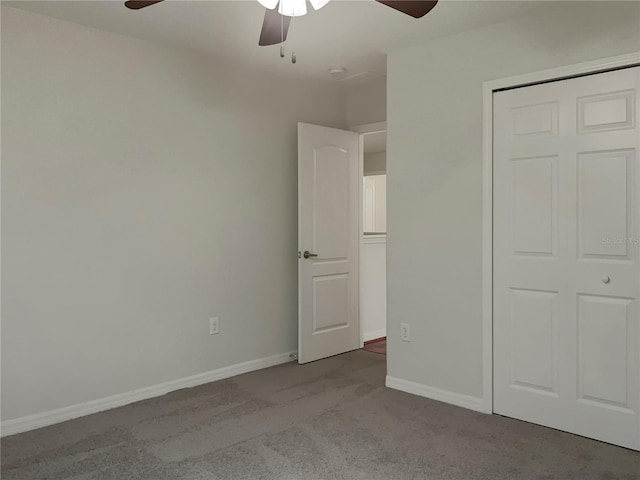 unfurnished bedroom featuring a closet, light carpet, and ceiling fan