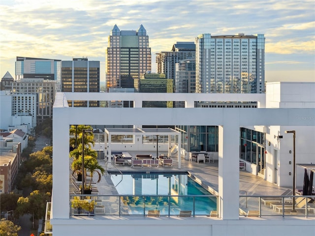 view of swimming pool with a patio area