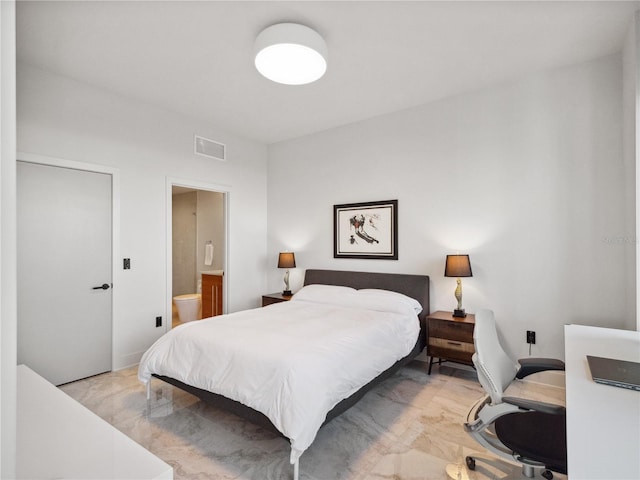 bedroom featuring ensuite bath