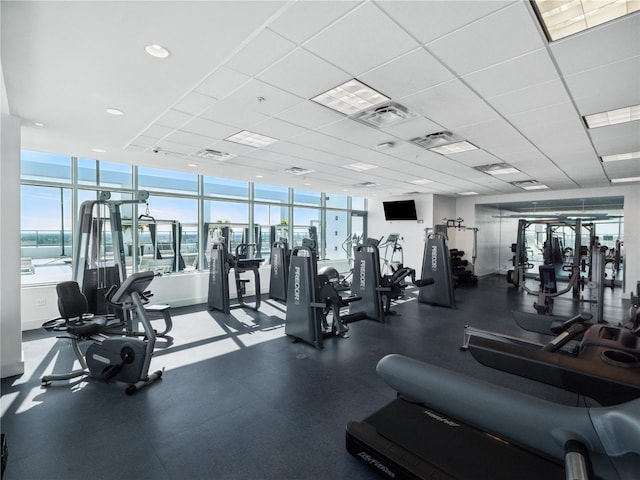 gym featuring a drop ceiling