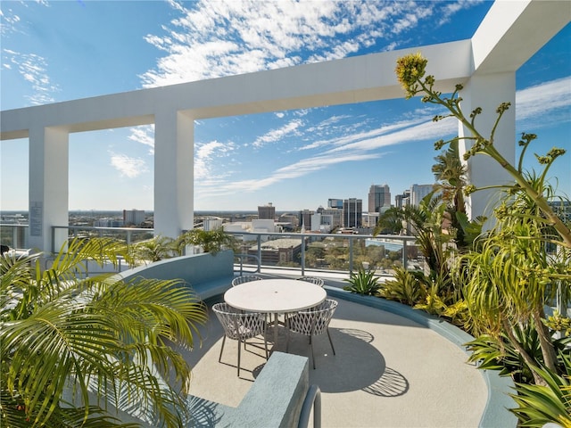 view of patio with an outdoor hangout area and a balcony