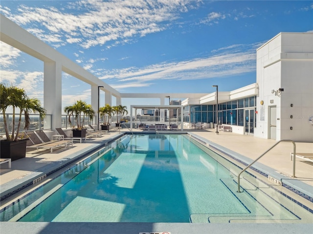 view of swimming pool with a patio area