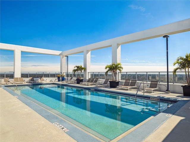 view of swimming pool with a patio area