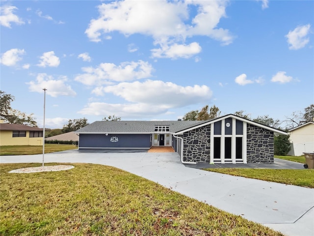 ranch-style house with a front yard