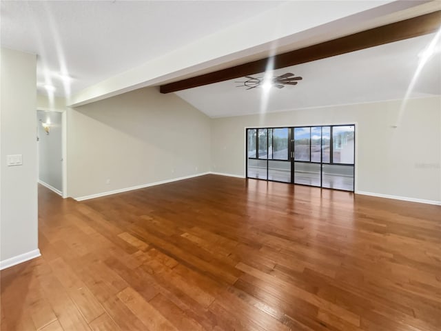 unfurnished living room featuring ceiling fan, wood-type flooring, and vaulted ceiling with beams