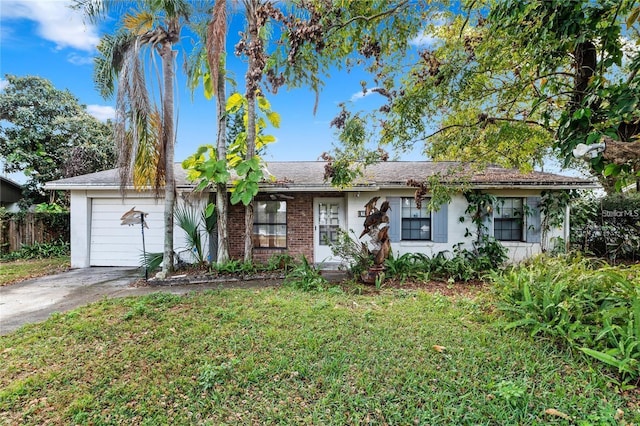 ranch-style home featuring a front lawn and a garage