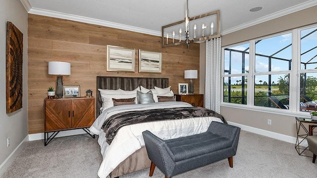 bedroom with multiple windows, wooden walls, crown molding, and light carpet