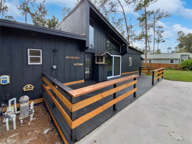 view of side of property with a deck