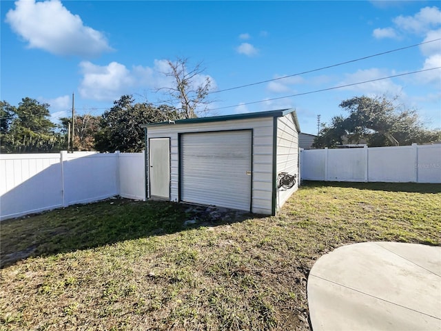 garage with a yard