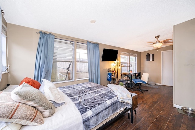 bedroom featuring ceiling fan and lofted ceiling