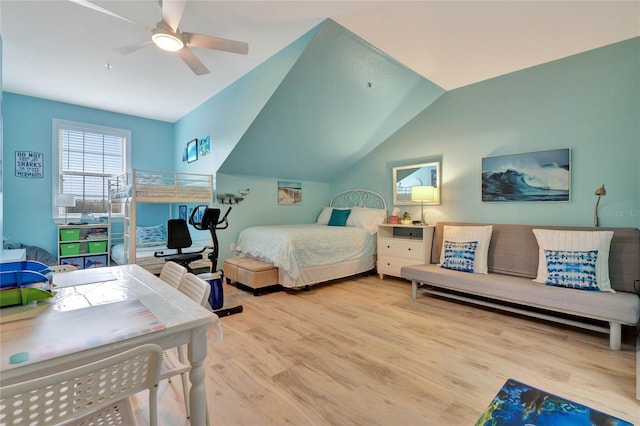 bedroom featuring vaulted ceiling, ceiling fan, and light hardwood / wood-style floors