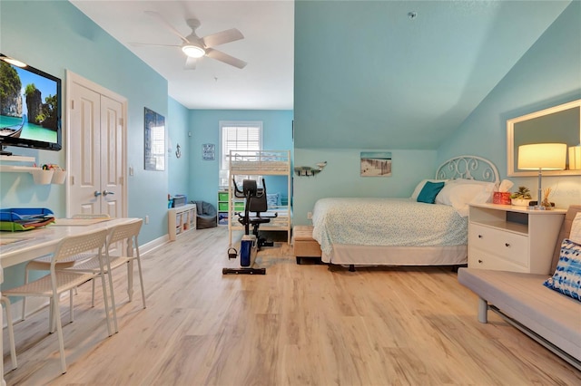 bedroom featuring ceiling fan, a closet, and light hardwood / wood-style floors