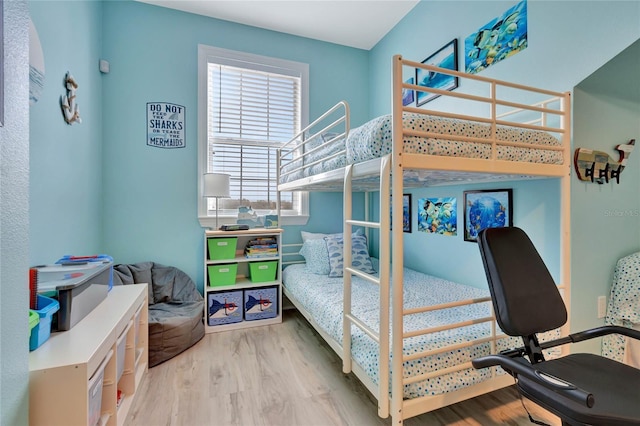 bedroom featuring light hardwood / wood-style floors