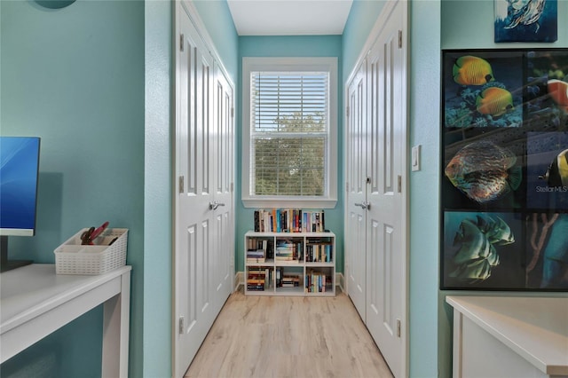 doorway with light hardwood / wood-style floors