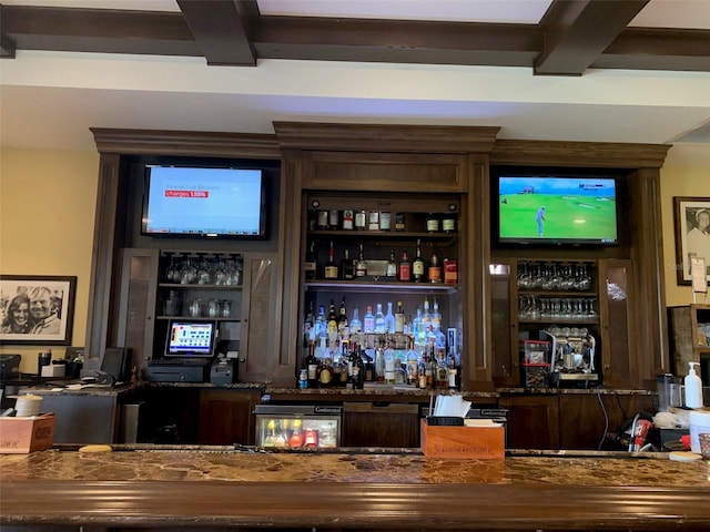 bar with beamed ceiling