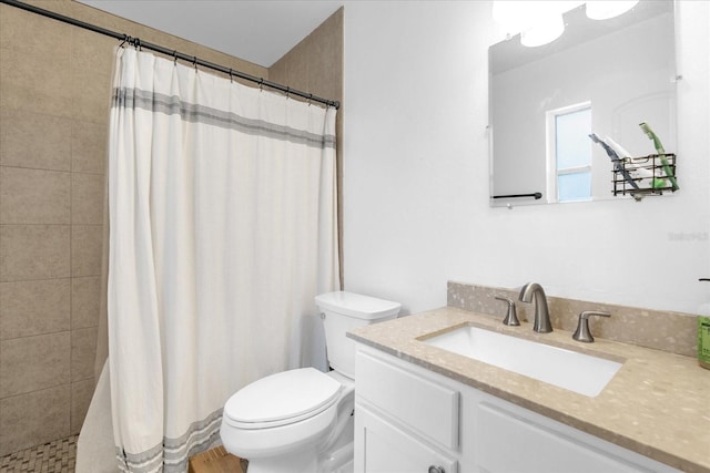 bathroom with walk in shower, vanity, and toilet