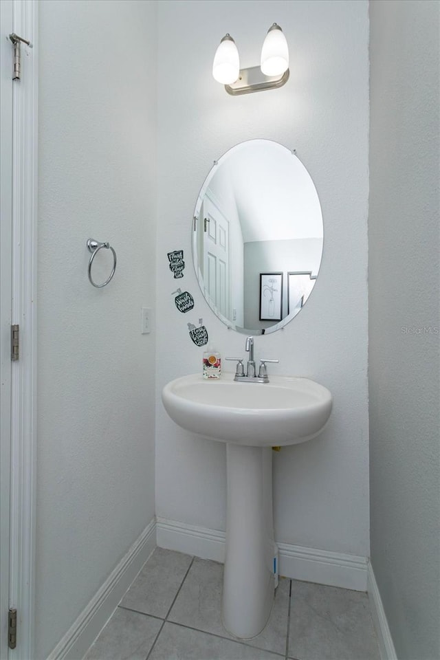 bathroom featuring tile patterned flooring