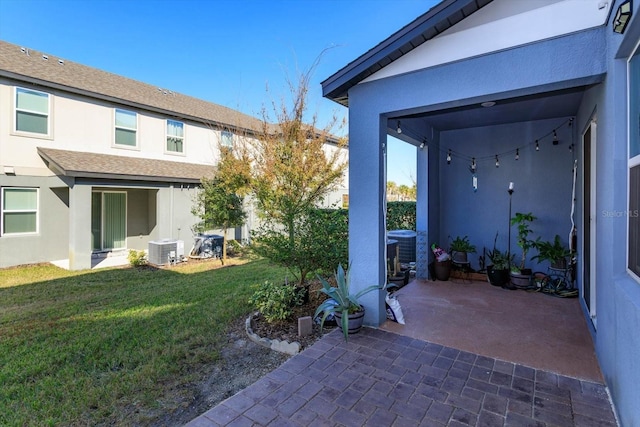 view of patio with central AC unit