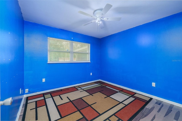 spare room featuring ceiling fan