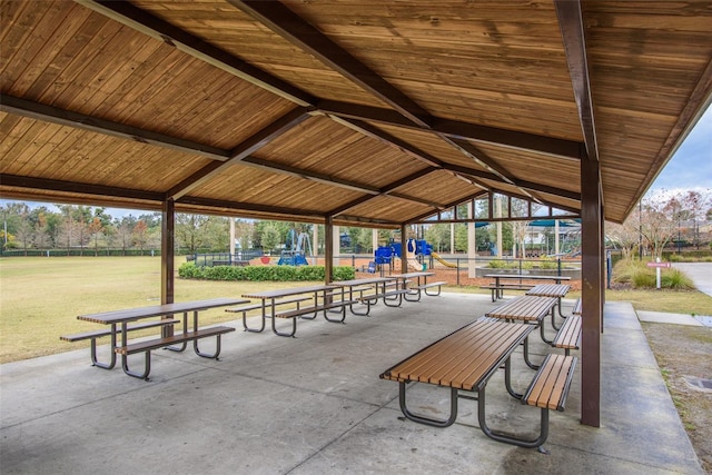 view of community with a playground and a lawn