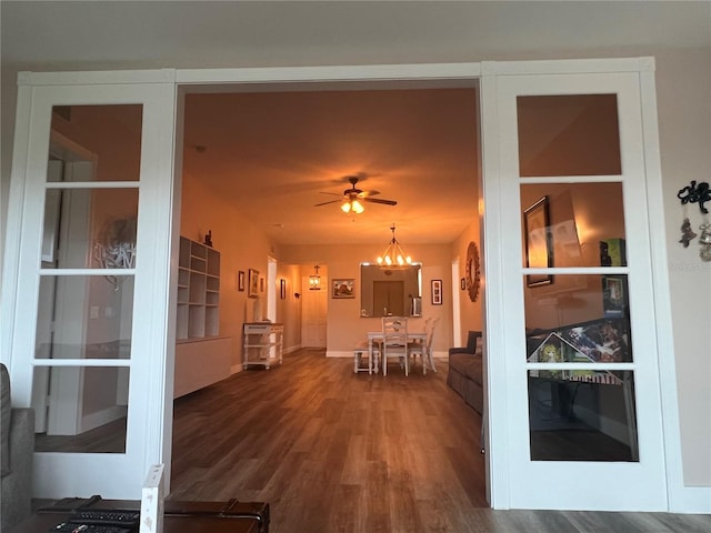 interior space with ceiling fan