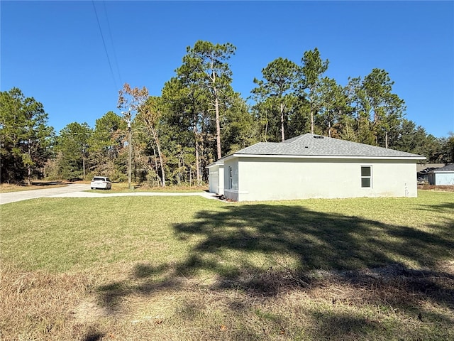 view of home's exterior featuring a yard