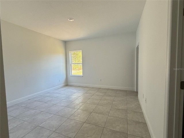 view of tiled empty room