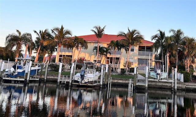 dock area featuring a water view and boat lift