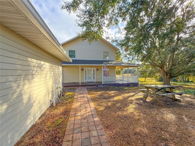 exterior space featuring covered porch