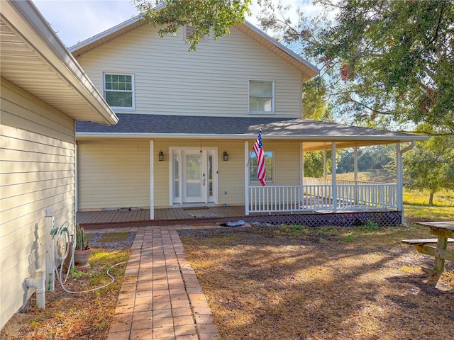 farmhouse inspired home with a porch